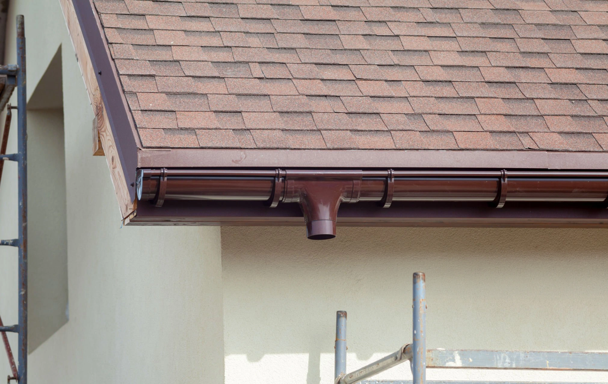 Gutter system installation and roof drainage improvements