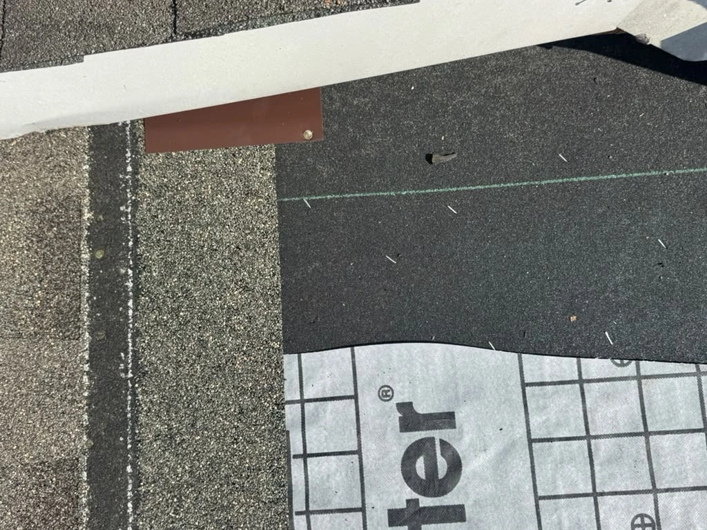 Roof repair service and inspection of exterior roofing materials